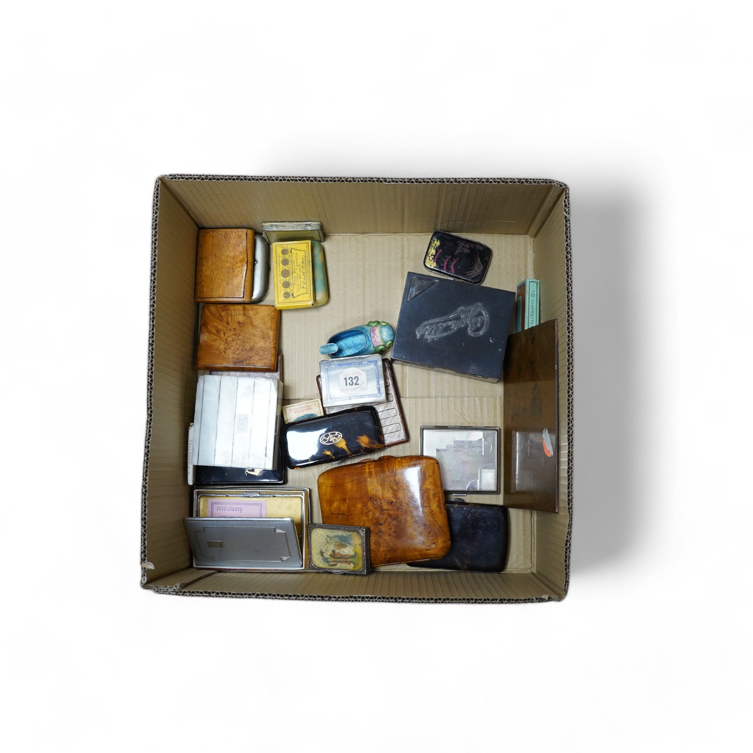 A silver mounted onyx and lapis match box with a shagreen striker to base, a larger similar silver mounted onyx cigarette box together with tortoiseshell, lacquer and mixed metal cigarette and cigar boxes etc., lapis and